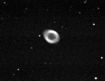 The gaseous ring around a white dwarf (the ring is illuminated by the ultraviolet radiation emitted by the star)