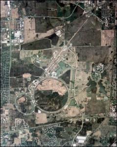 Aerial view of the Fermi National Accelerator Laboratory (U.S.A.). Particles are accelerated in the huge rings at centre
